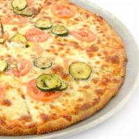 White Pie Thin Crust Pizza · Garlic-infused olive oil base, zucchini, tomatoes, feta. No tomato sauce.