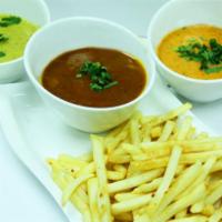 Curry and Fries · Choice of masala, korma or curry sauce served with masala fries.