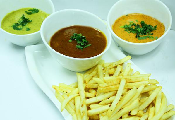 Curry and Fries · Choice of masala, korma or curry sauce served with masala fries.
