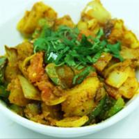 Mumbai Aloo · Baby potatoes, tomatoes, onions prepared with toasted cumin seeds & fresh Indian spices. Acc...