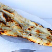 Naan · Our classic soft leavened white bread, great for dipping in curries. Plain or with butter. B...