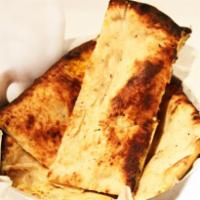 Paneer Naan · Homemade cheese stuffed in a soft naan. Baked in our traditional clay tandoor oven from India.