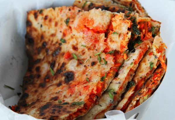 Chicken Tikka Naan · Soft naan stuffed with chopped chicken tikka. Baked in our traditional clay tandoor oven from India.