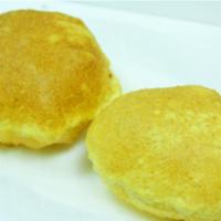 Poori · 2 pieces. Whole wheat puffed bread and deep fried.