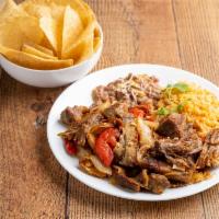 Carnitas · Charbroiled marinated pork tips, topped with fried onions, bell peppers and fresh tomatoes. ...