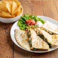 Spinach Quesadillas · Jack cheese, tender spinach, mixed veggies, all melted between tossed flour tortillas. Serve...