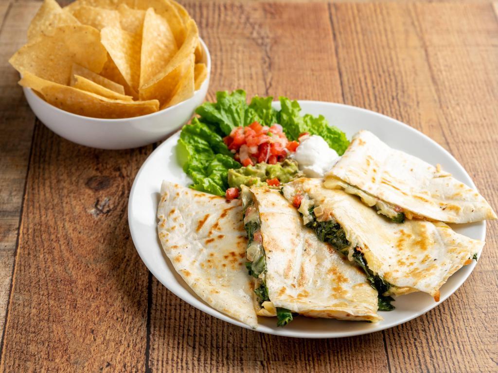 Spinach Quesadillas · Jack cheese, tender spinach, mixed veggies, all melted between tossed flour tortillas. Served with sour cream and pico de Gallo.