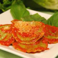 Spinach Ravioli Pasta Lunch · Homemade ravioli lled with ricotta and spinach in a light tomato basil sauce.