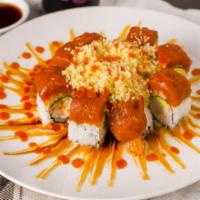 Fire Roll · Fried shrimp, crab meat, avocado topped with spicy tuna, tempura flakes, eel sauce, spicy ma...