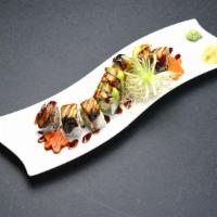 Dragon Roll · Crabmeat, avocado, and cucumber with eel, avocado, eel sauce on top.