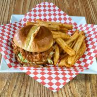 Chicken Sandwich Combo · Three chicken fingers with Uncle Joe's sauce and lettuce on a brioche bun. Comes with fries ...