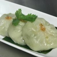 Chive Dumpling · Steamed chive dumpling and dumpling sauce.