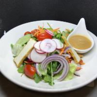 Thai Salad · Green salad, tomato, red onion, carrot, tofu, egg and peanut dressing.