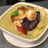 Green Curry [din.] · Coconut milk, bamboo shoot, bell pepper, eggplant and basil.