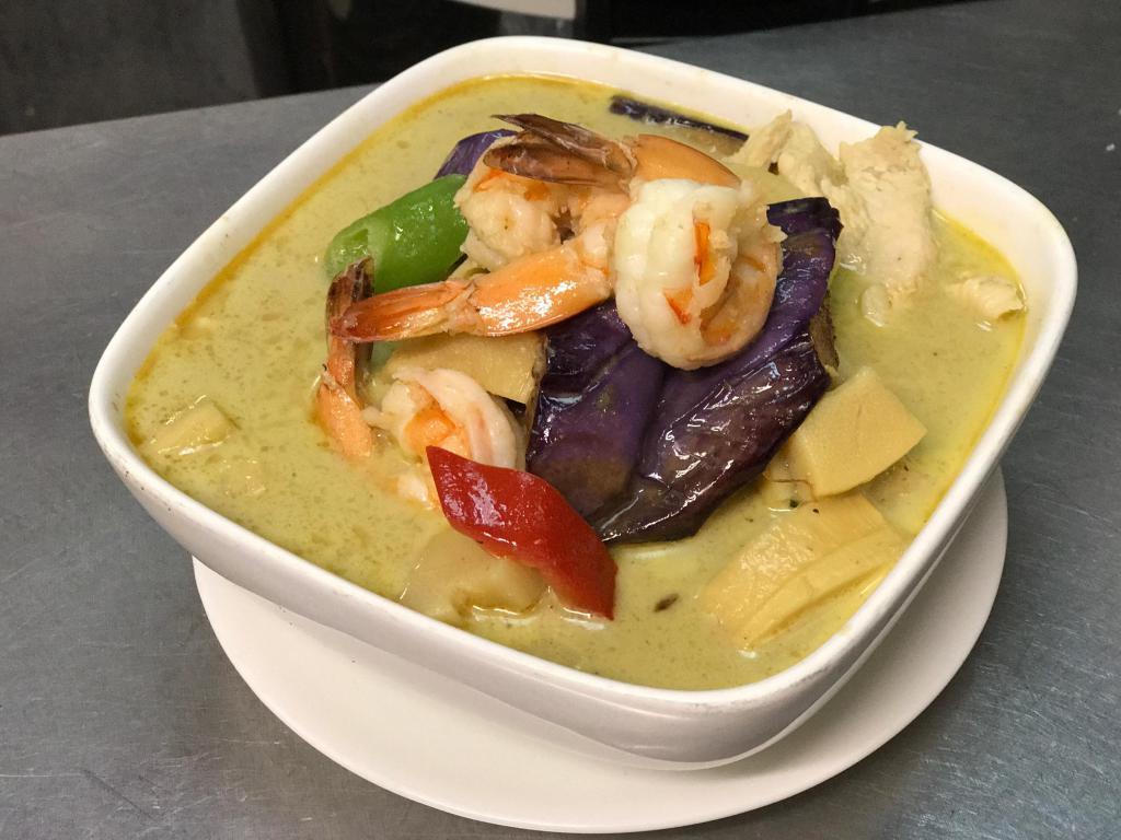 Green Curry [din.] · Coconut milk, bamboo shoot, bell pepper, eggplant and basil.