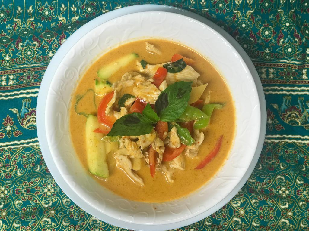 Red Curry [din.] · Coconut milk, bamboo shoot, bell pepper, zucchini and basil.