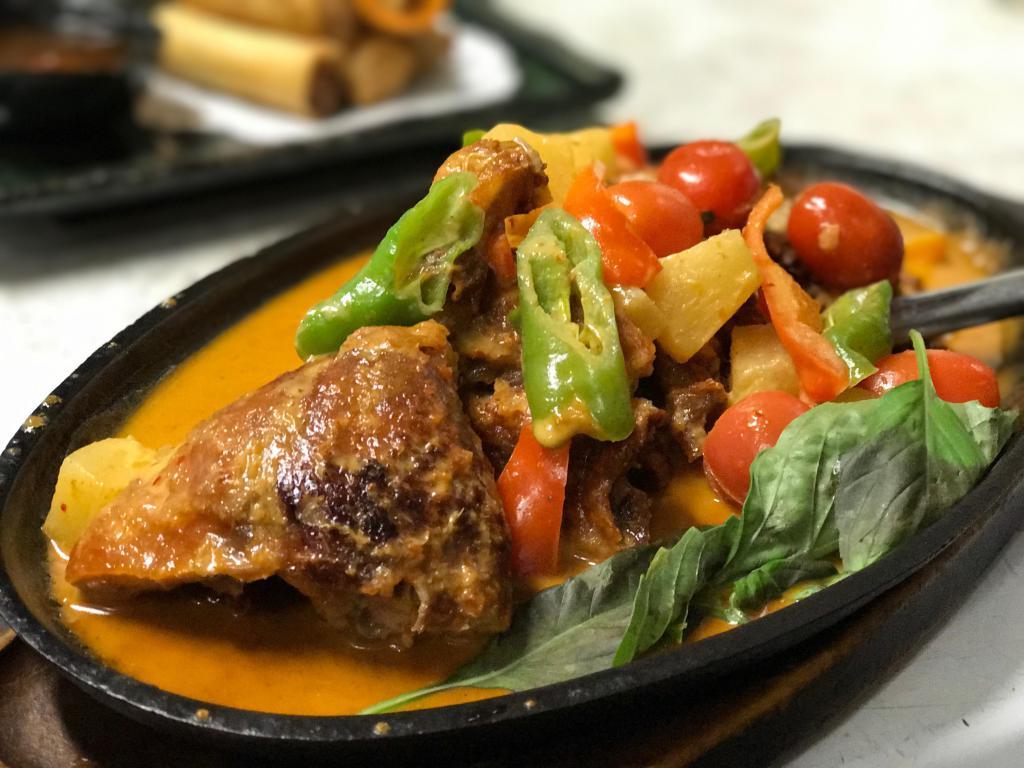 Curry Duck · Bell pepper, pineapple, tomato, basil and curry sauce.