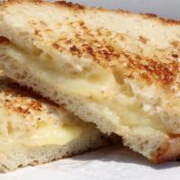Grilled Cheese · Cheddar cheese melted on grilled country bread