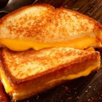 Grilled Cheese Sandwich · White or wheat bread and American or cheddar cheese with crinkle cut fries