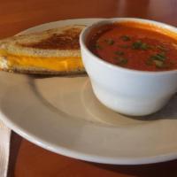 Main Street Grilled Cheese Sandwich · Yellow and white American cheese, sliced tomatoes, onions on white bread.