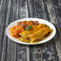 Chile Verde Enchiladas · 2 soft corn tortillas stuffed with chunks pieces of pork and topped with green tomatillo sau...