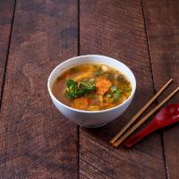 11. Tom Yum · Spicy and sour soup with mushrooms, carrot, lemongrass and lime juice. 