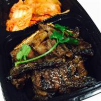 Korea Beef · Grilled beef short rib marinated and served with homemade kimchi.