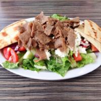 Gyro Chef Salad · Choose from Greek , garden, or tabuleh salads. Comes with gyro meat, and pita bread with taz...