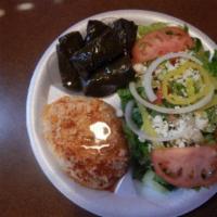 Vegetarian Sampler Platter · Hommos, grape leaves, and choice of salad served with rice and pita bread.