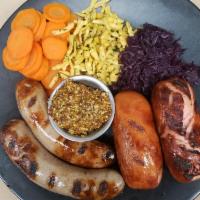Wurst Dinner Platter · (2) of each bratwurst, knockwurst, served with German mustard, spatzle, red cabbage, boiled ...