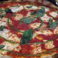Margherita Pizza · Fresh mozzarella, plum tomato and basil puree.