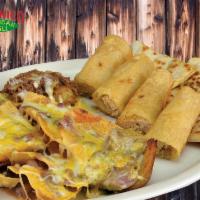 Sampler · Quesadilla, nachos, chicken taquitos and potato skins with chile verde pork and shredded beef.