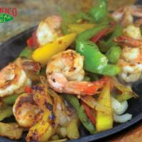 Shrimp Fajitas · Large shrimp grilled with onions and bell peppers. Served with rice, beans, flour or corn to...