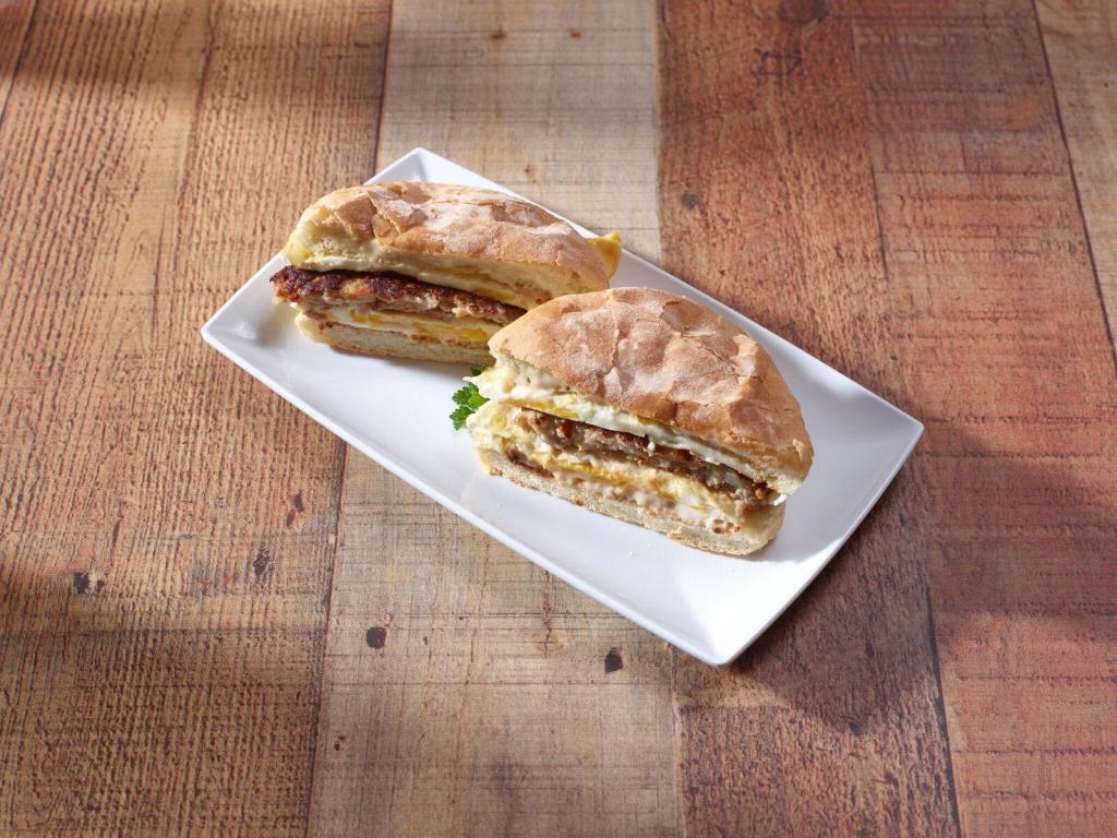 New York Style Sandwich · 2 eggs with choice of meat topped with cheese on a hard roll.