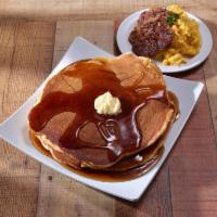 Brooklyn Combo · Two pancakes or French toast with two eggs and a choice of meat.