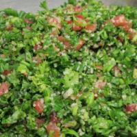 Tabouli Salad · Bulghur and parsley salad. Parsley, cracked wheat, tomato, onion and lemon juice. Vegan.