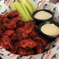 Boneless Wings · Tossed in the sauce of your choice and served with choice of dressing.