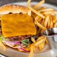 Impossible Chophouse Burger · ImpossibleTM Patty, LTO, Pickles, Cheddar Cheese, Thousand Island Dressing, Toasted Sesame S...