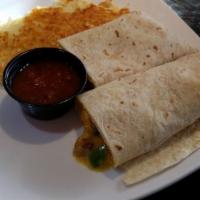 Jukebox Breakfast Burrito · 2 country eggs scrambled with green peppers, sausage, onions, homemade salsa and cheddar che...