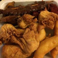 Pu Pu Platter for 2 and Large Pork Fried Rice · Two egg rolls, two beef teriyaki, four chicken wings, two fried shrimp, six chicken fingers,...