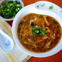Hot and Sour Soup · Hot and spicy. Tofu, bamboo shoots and wood ear mushrooms, french mushroom, sprinkled with h...
