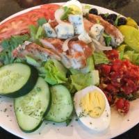 California Cobb Salad · Grilled chicken breast, bacon, tomatoes, hard-boiled eggs, Gorgonzola cheese, roasted red pe...