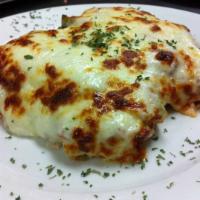 Large Homemade Meat Lasagna · Served with choice of side and fresh Italian bread.