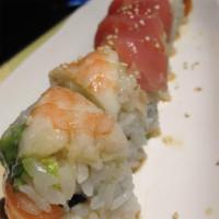 #16 Roll · Salmon, avocado and spicy mayo roll topped with shrimp, tuna and ponzu butter sauce.