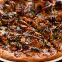 B.B.Q. Chicken Pizza · Mozzarella, B.B.Q. sauce, chicken breast, red onions, and cilantro.