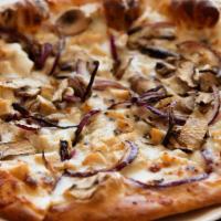 Ranch Chicken Pizza · Mozzarella, ranch dressing, chicken breast, mushrooms, and red onions.