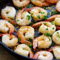 Koy Shrimp · Pan seared shrimp tossed in house seasoning and lemon juice. Gluten free.