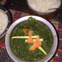 Saag Aloo       (Vegan available If requested) · Potato and spinach fully sauteed with herbs and Indian species.  Served with basmati rice.