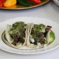 2 Taco Classico · Chicken, steak or chili meat in a soft corn tortilla, chopped onion and cilantro with hot or...