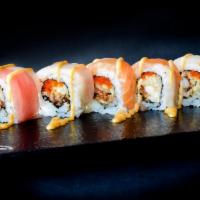 Tarantula Roll · Soft shell crab, cucumber and spicy mayo topped with shrimp, red snapper, yellowtail, tuna a...